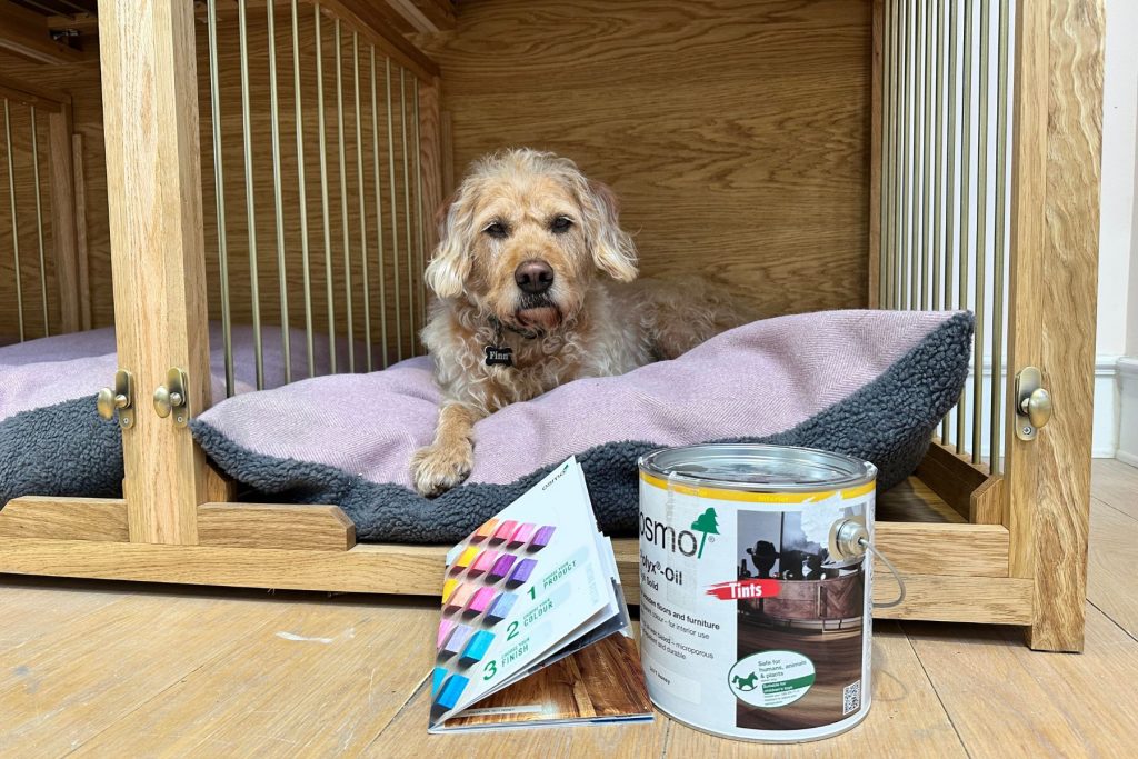 Dog in oak bedroom piece with Osmo Polyx Oil for finishing furniture. 