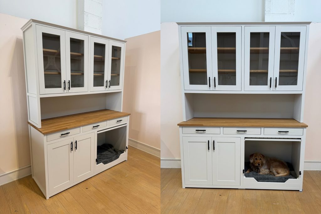 Ammonite dog crate sideboard with glass fronted display cupboards and oak shelves, solid oak worktop, black bar handles, three drawers, double cupboard and dog bedroom with up and over door, with The Pet Carpenter's dog Finn lying inside