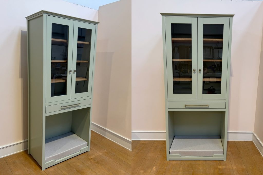 Tall slim Vert de Terre dog crate dresser with glass fronted display cupboard and oak shelves, silver knobs and bar handle drawer, and open dog bedroom with fitted grey cushion